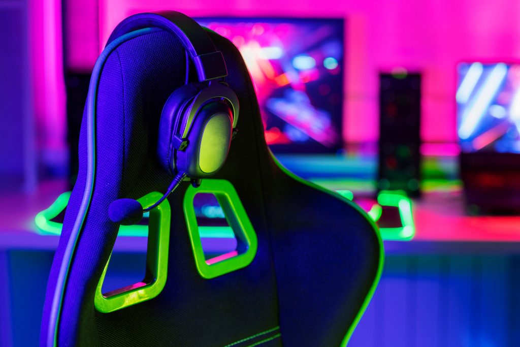 gaming-setup-with-headphones-chair-11zon